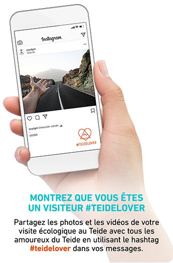 Main en train de soutenir le portable avec Instagram Teide Lover